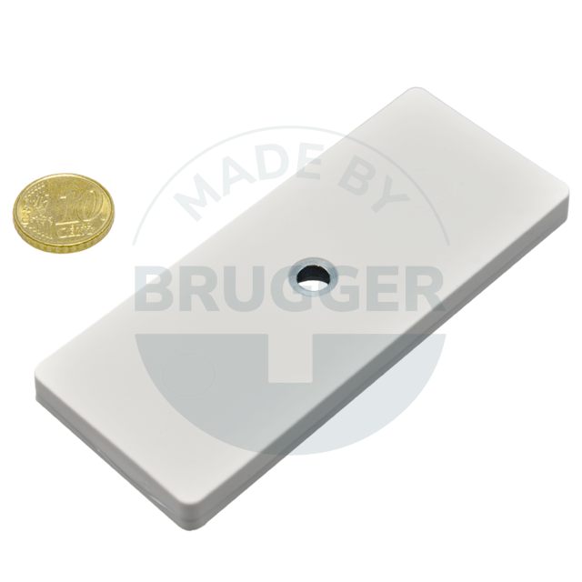 Rubberised magnet system with hole and countersink rectangular white | © Brugger GmbH